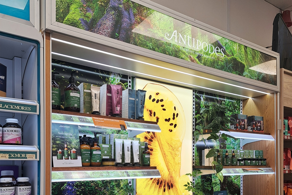 Antipodes shelving display in pharmacy.